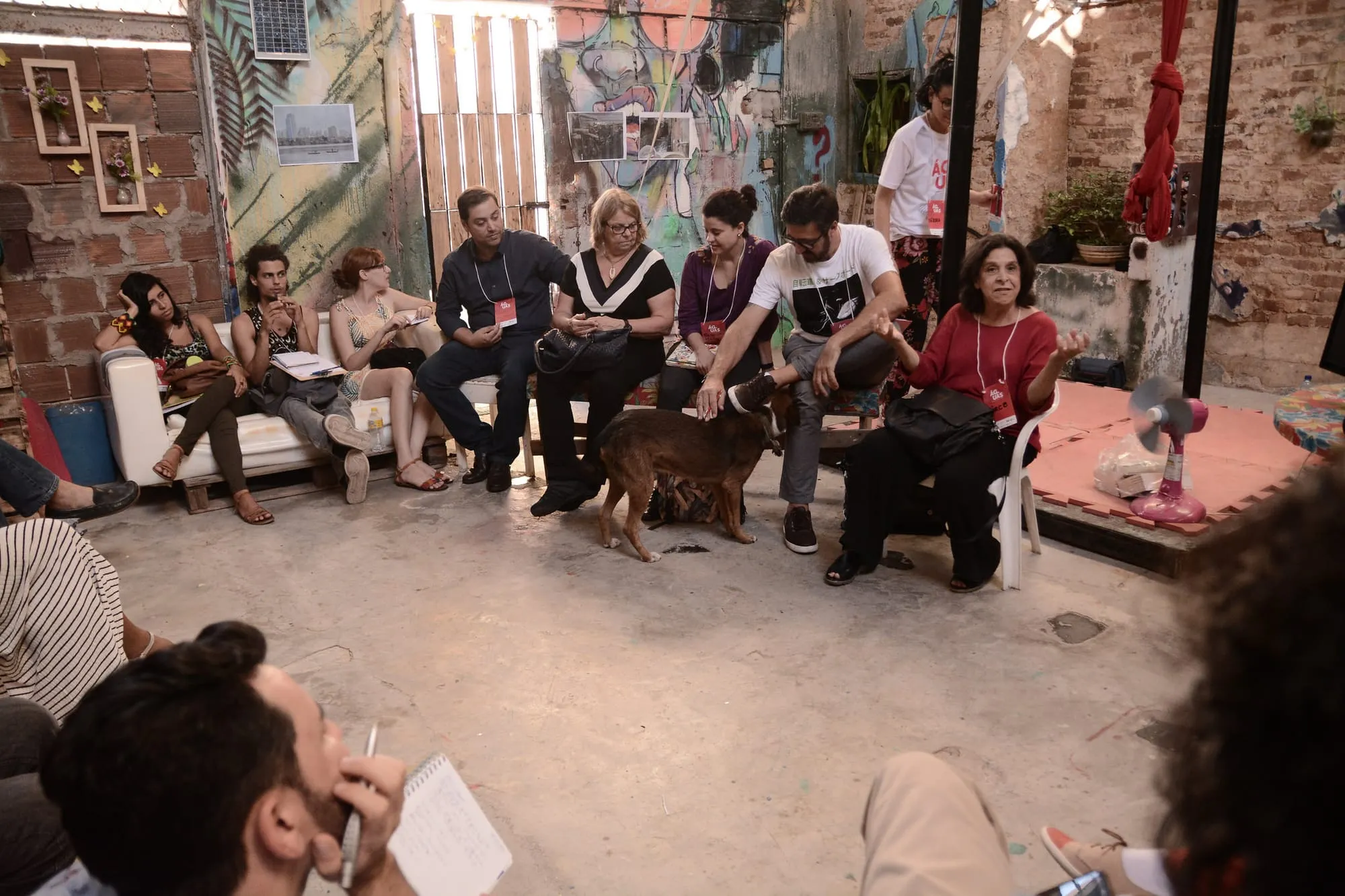 Speakers and guests in conversation during the round table