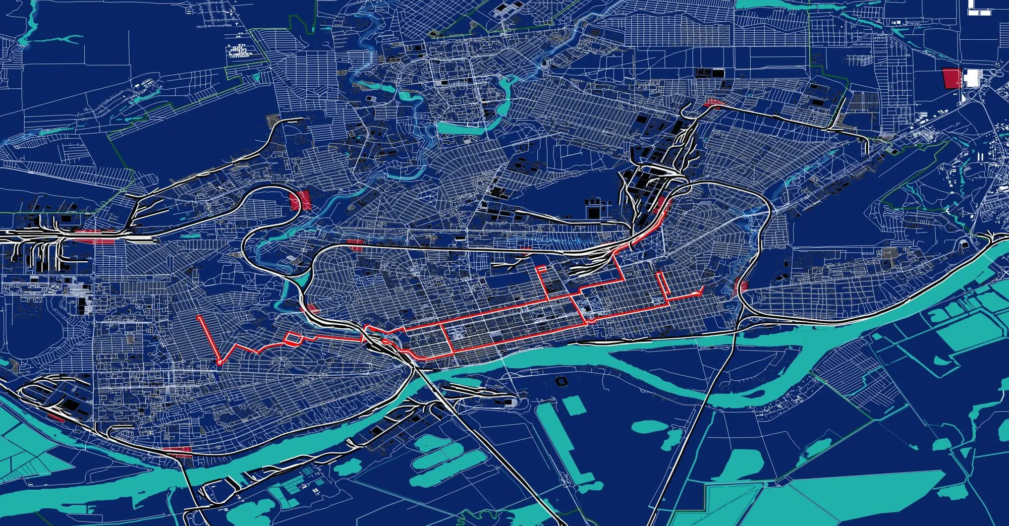Dark blue map of Rostov-on-Don with railway lines in white, tram lines in red and interchange sites marked